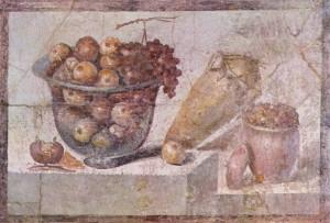Un affresco di Pompei con frutta, che può suggerirci alcuni dei gusti a tavola degli antichi romani. Wikipedia