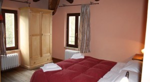 Una delle camere da letto www.booking.com dd