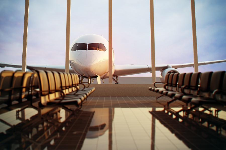 airplane-view-from-airport-terminal-_shutterstock_124713472_low